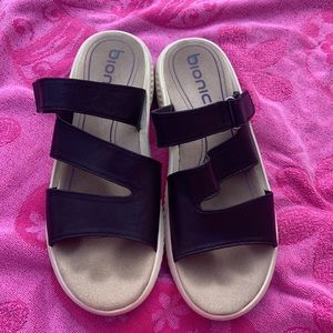 BIONICA AVOCA BLACK LEATHER SLIP ON SANDALS. Size woman’s 10